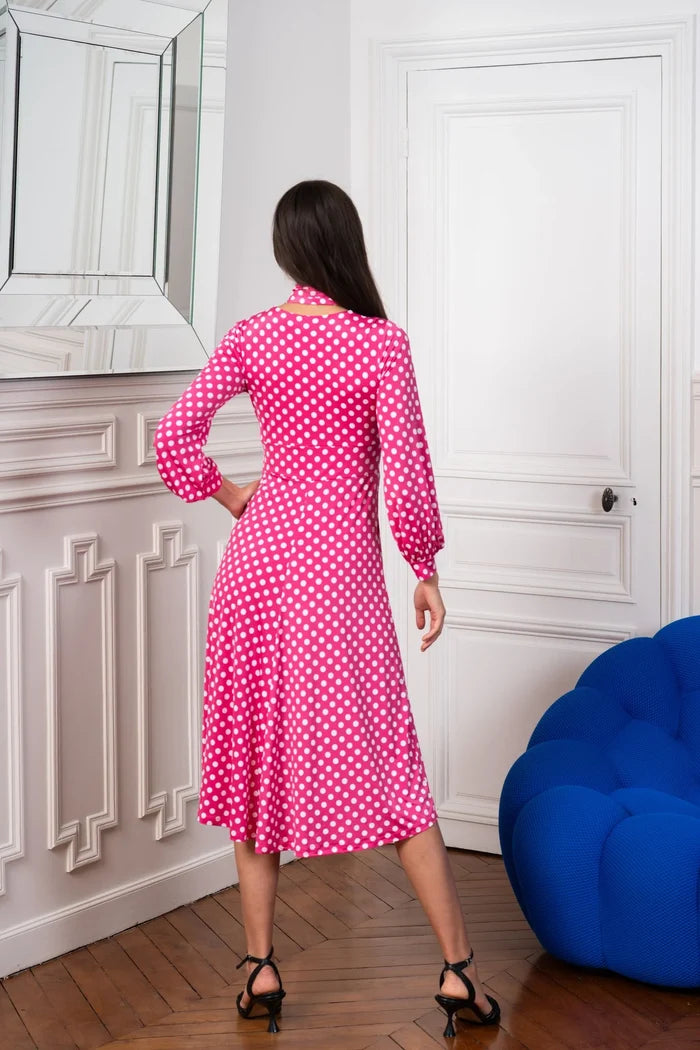 Model wearing an Elegance Miss pink midi dress
