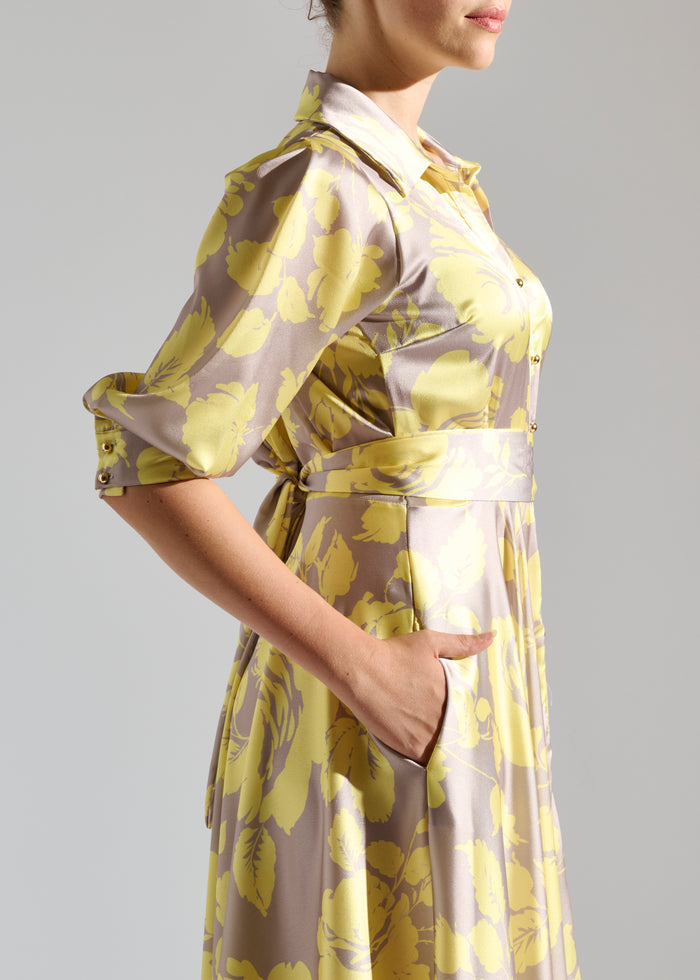 Side view of Kayz pastel maxi dress with white floral pattern.