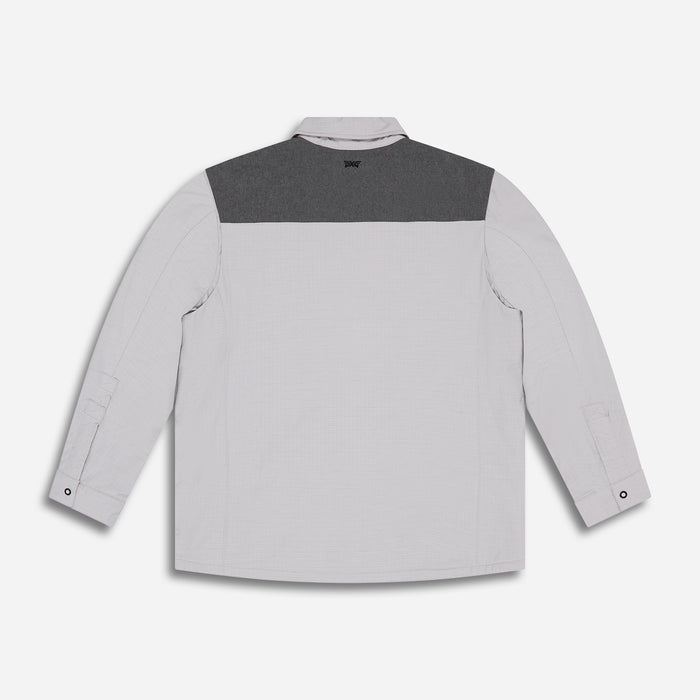 PXG men's gray padded shirt jacket on a white background