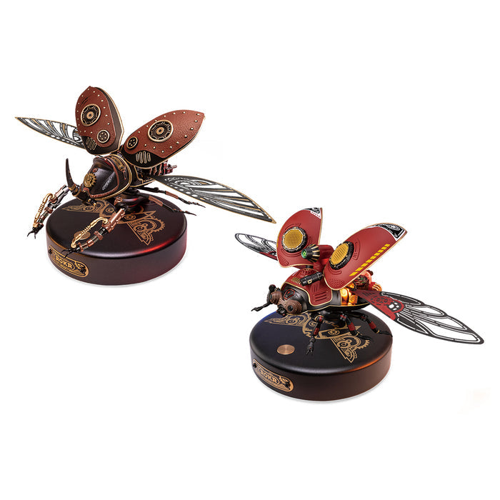 Two ROKR steampunk insect mechanical models on round display bases, bee and butterfly in red and gold