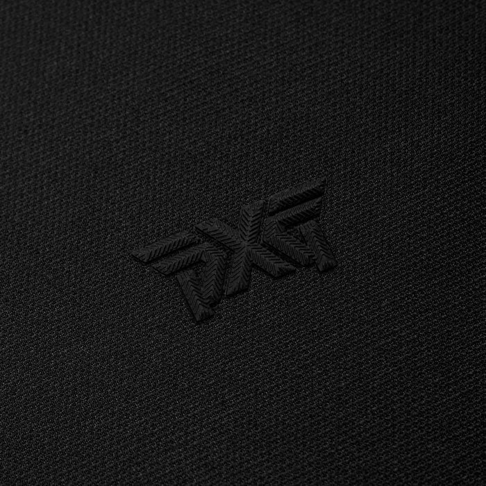 Women's Asymmetrical Snap Collar Polo in Black, lay flat logo detail view