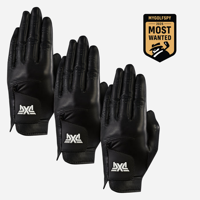 Three black leather golf gloves with white DX4 logos on the back of the hands, arranged on a light gray background with a 'My Golfspy Most Wanted' badge in the top right corner.