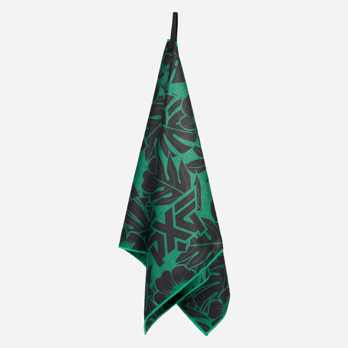 PXG black and green aloha players towel with black flowers and leaves on a white background