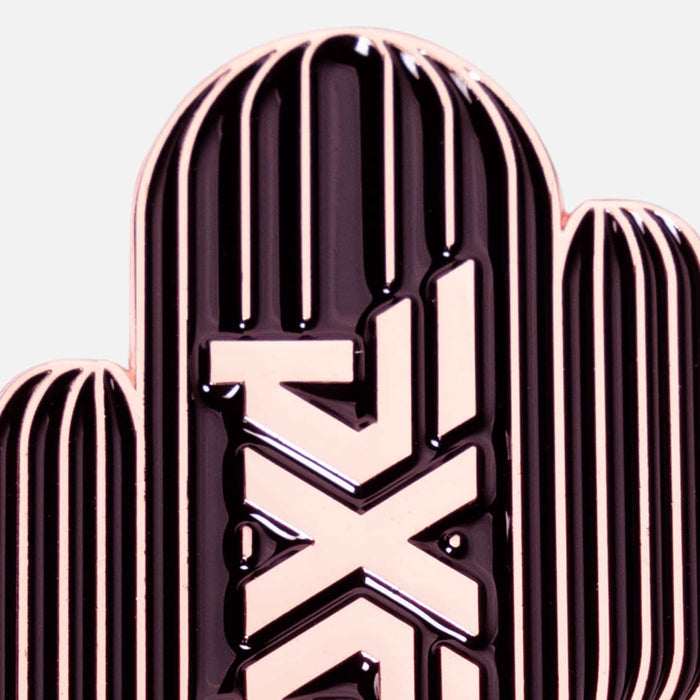 PXG copper cactus golf ball marker on a white background