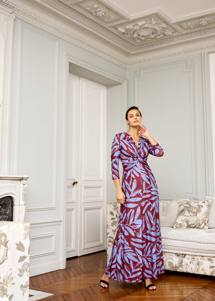 woman models knot-front maxi dress