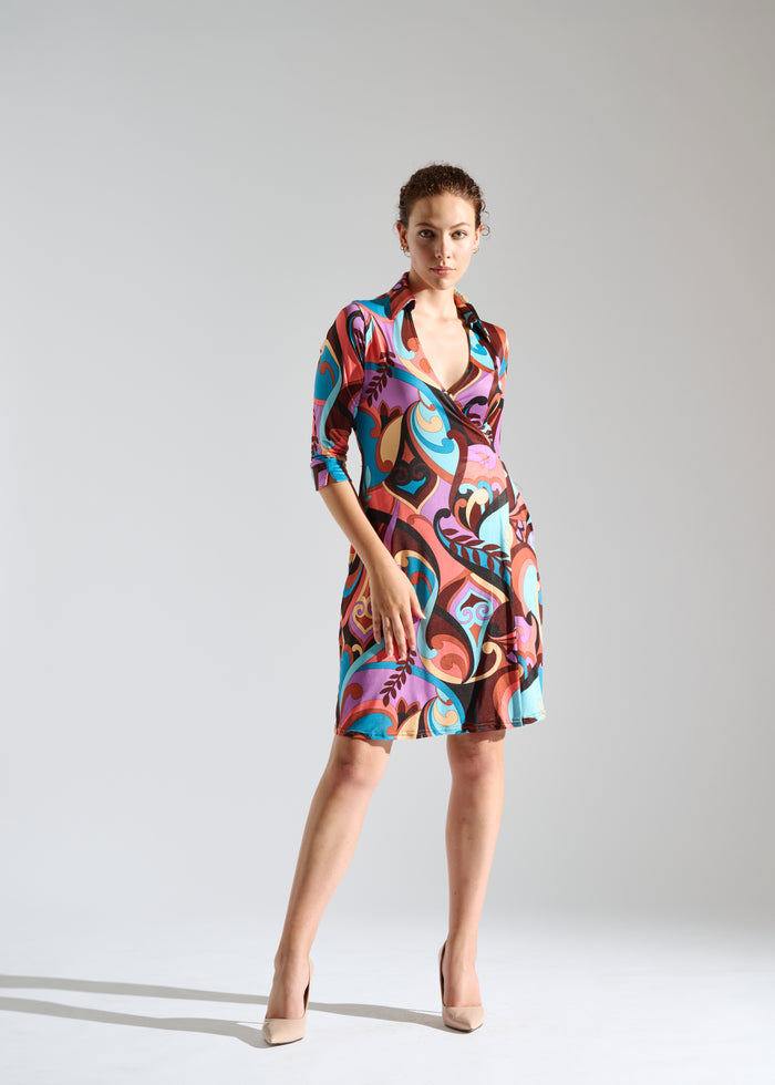 Woman models an Elegance Miss multicolor wrap dress