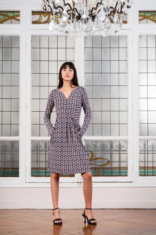 Model wears Elegance Miss long sleeve knee length dress