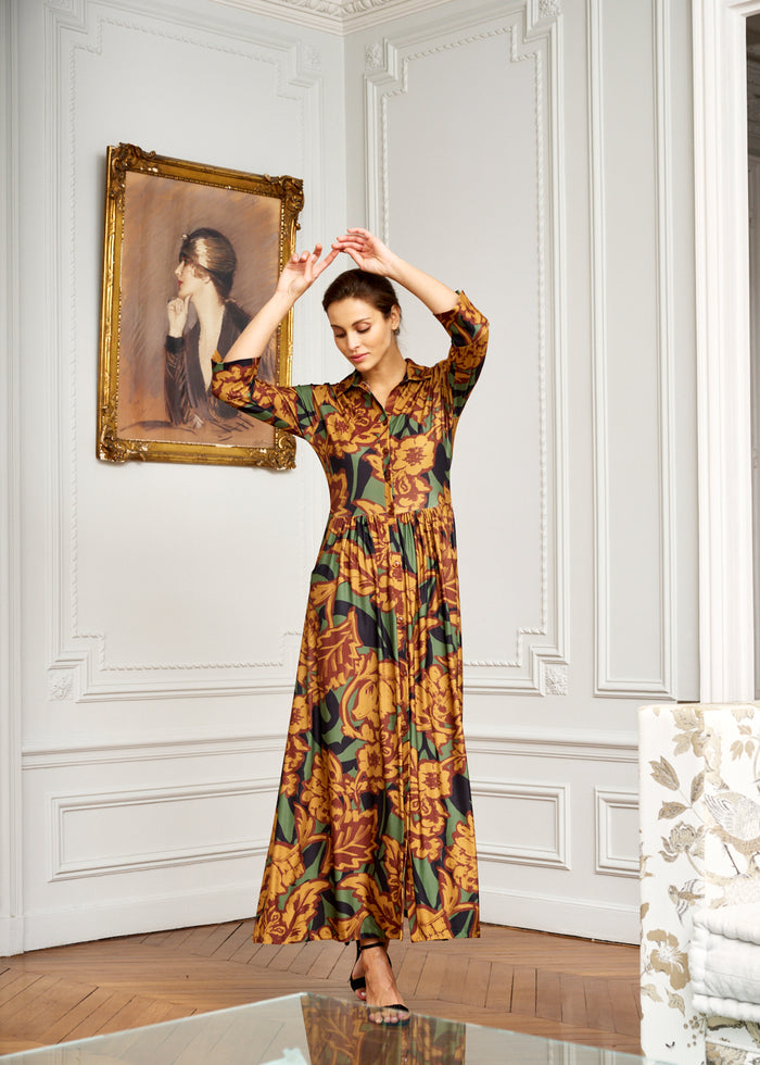 woman models floral wrap dress