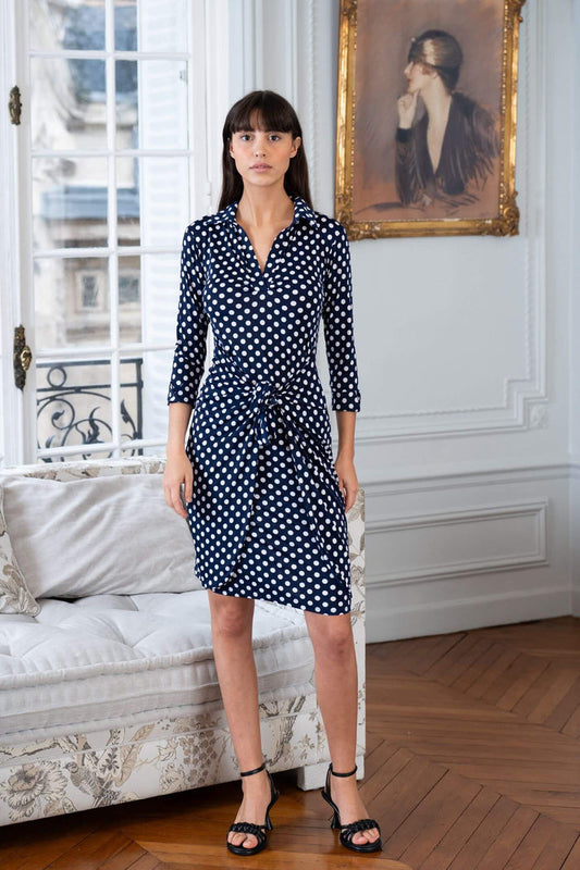 Model poses in Elegance Miss knot waist dress