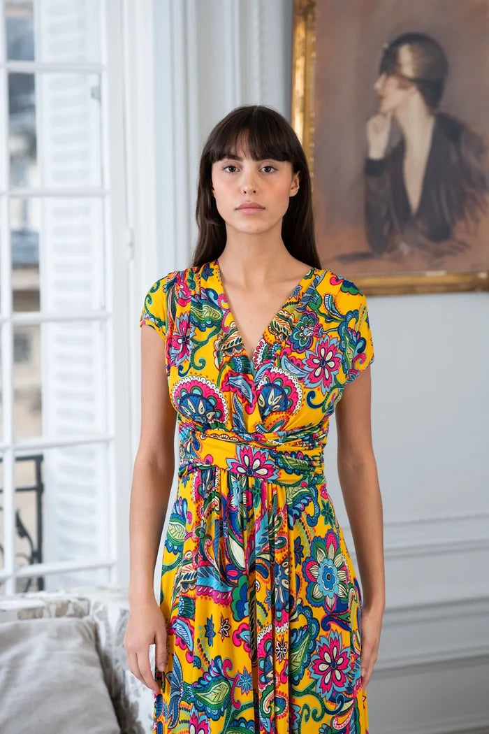Model wears a boho short sleeve maxi dress in Paris