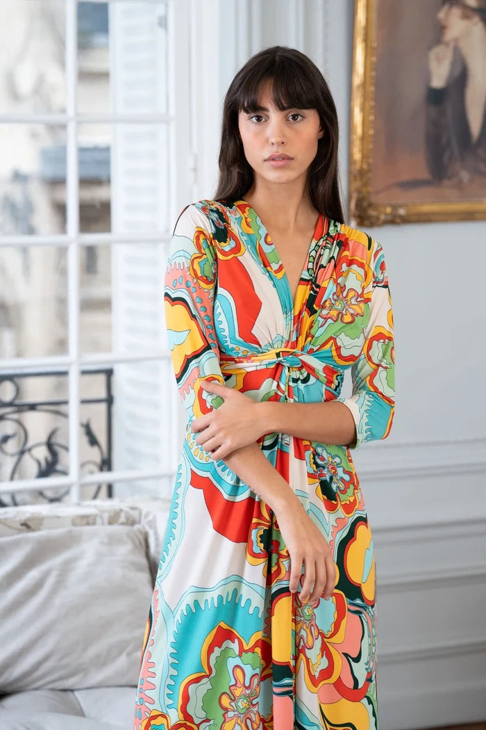 Woman wears twist front maxi dress