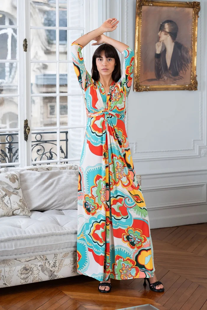 Woman models retro floral maxi dress