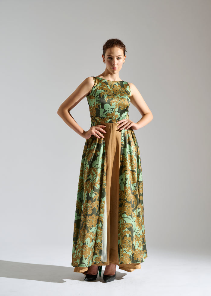 Full view of Gio black sleeveless maxi dress with brown and green floral pattern.