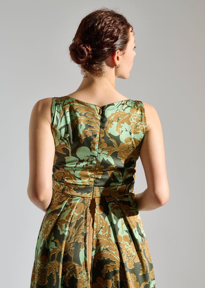 Gio black sleeveless maxi dress with brown and green floral pattern, back view.