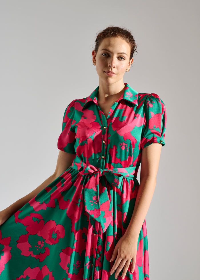 Close up of Kimberle green and red floral-patterned maxi dress.