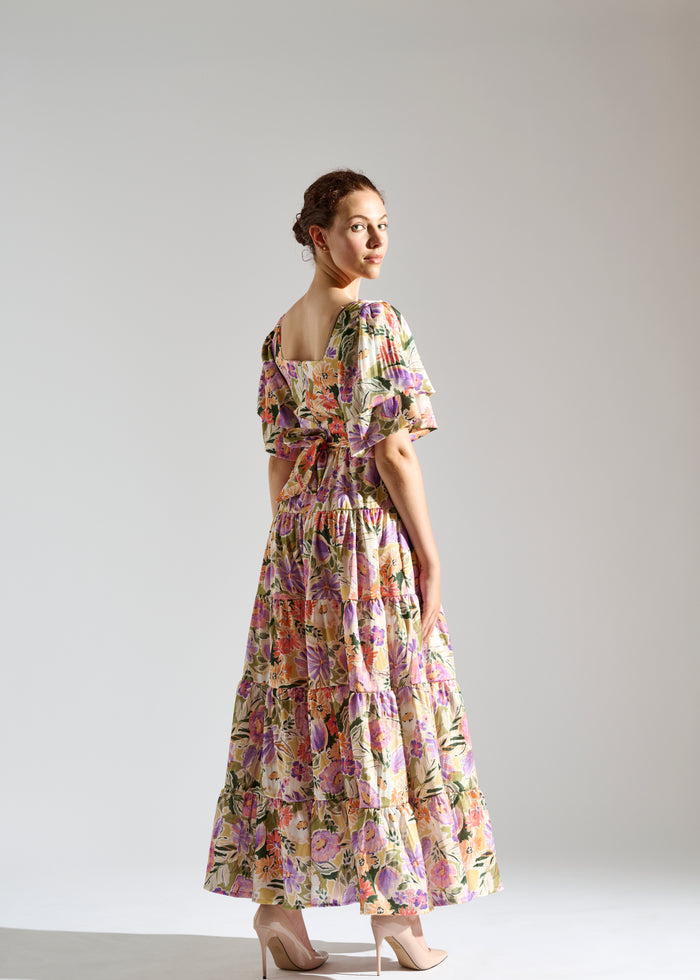 Back view of Klay garden-patterned pastel maxi dress.