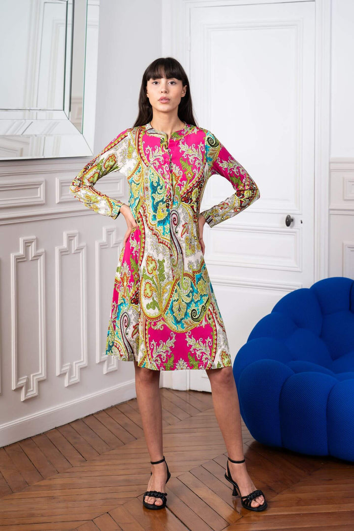 Model poses in Elegance Miss paisley printed dress