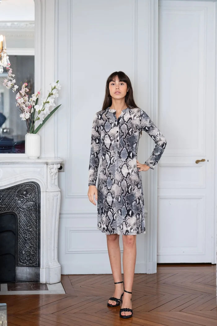 Model wears an Elegance Miss button front women's dress