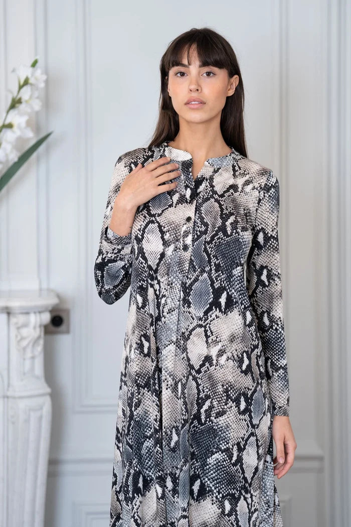 Model dons button front women's dress