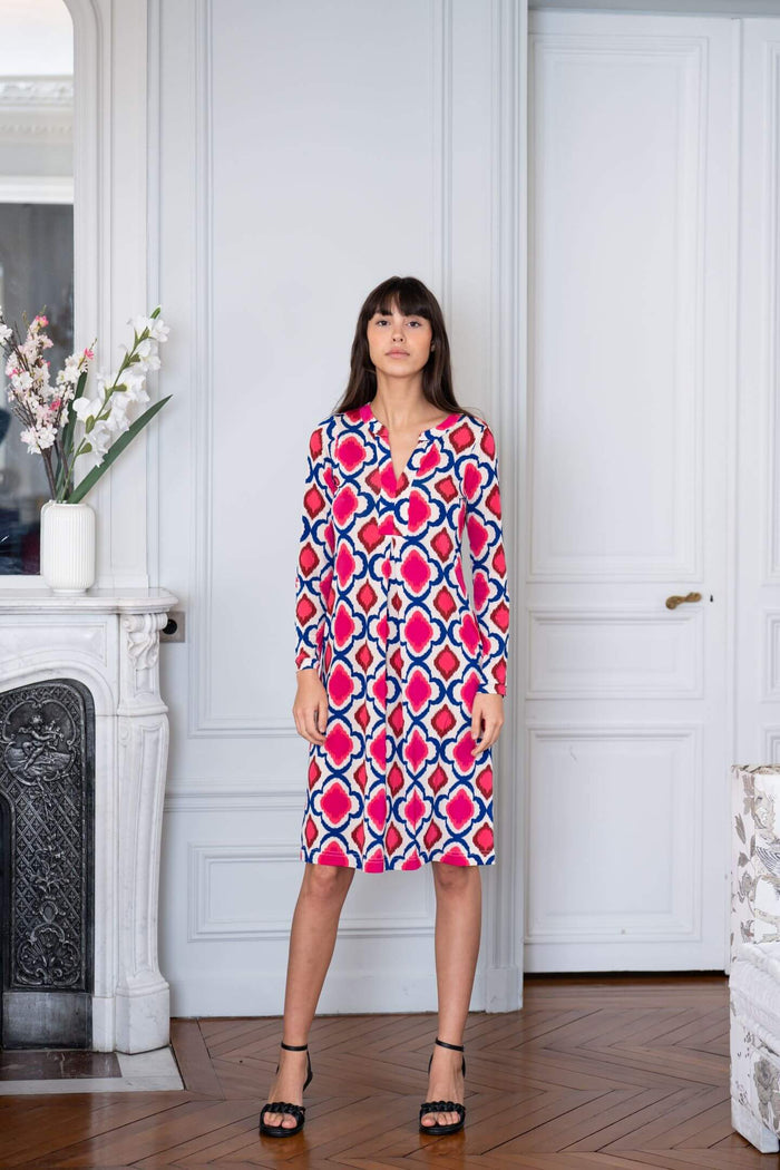 Model wears an Elegance Miss long sleeved patterned dress