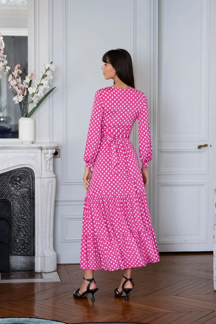 Woman wears women's pink polka dot dress