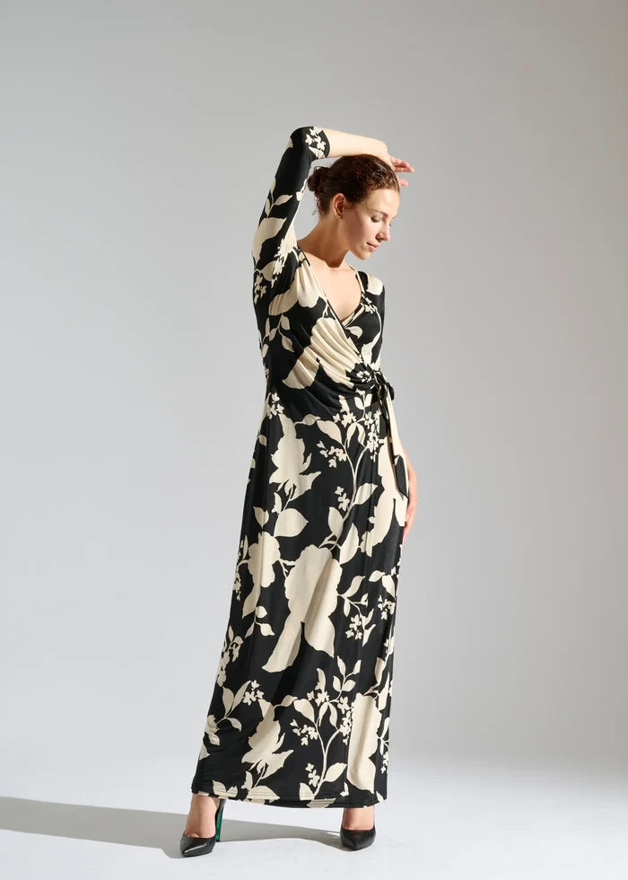 Woman wearing three-quarter sleeve maxi dress