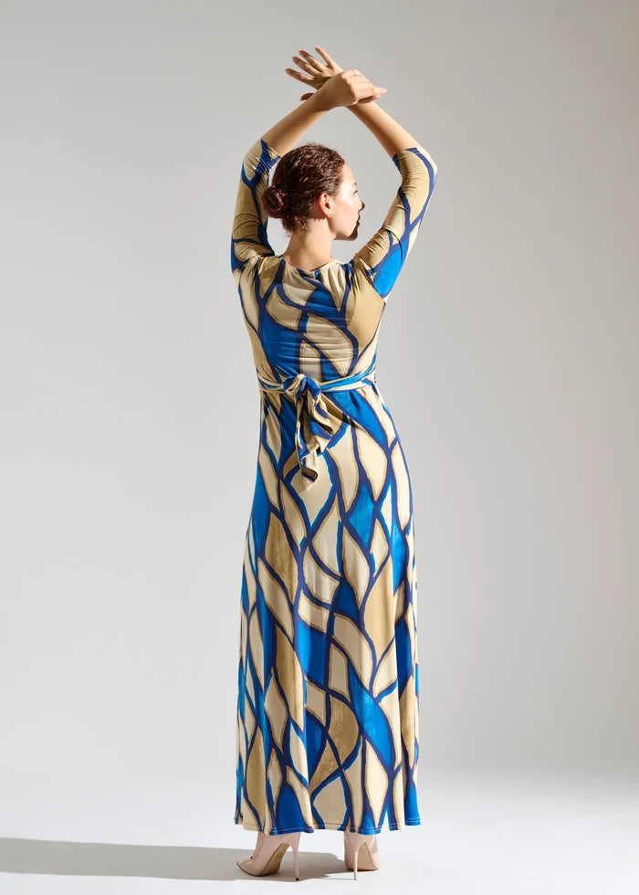 Woman models three-quarter sleeve wrap dress