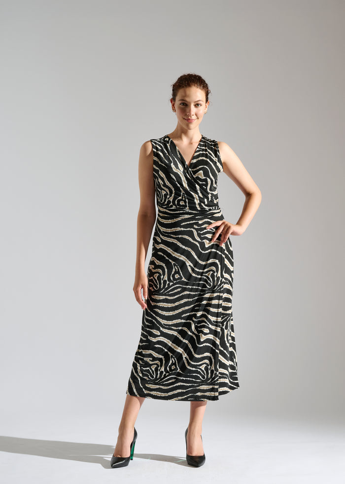 Milou black sleeveless maxi dress with animal-like pattern.