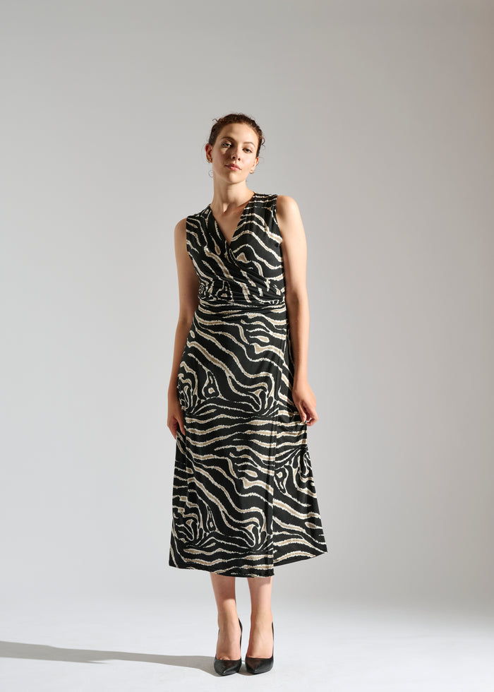 Full view of Milou black sleeveless maxi dress with animal-like pattern.