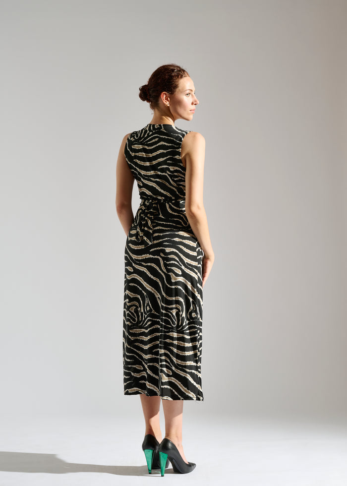 Back view of Milou black sleeveless maxi dress with animal-like pattern.