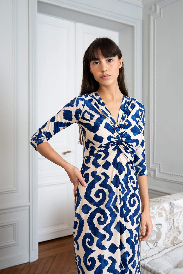 Woman wearing V-neck twist front dress