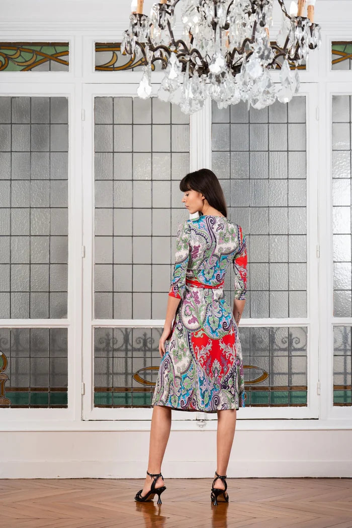 Woman models Elegance Miss boho paisley dress in Paris
