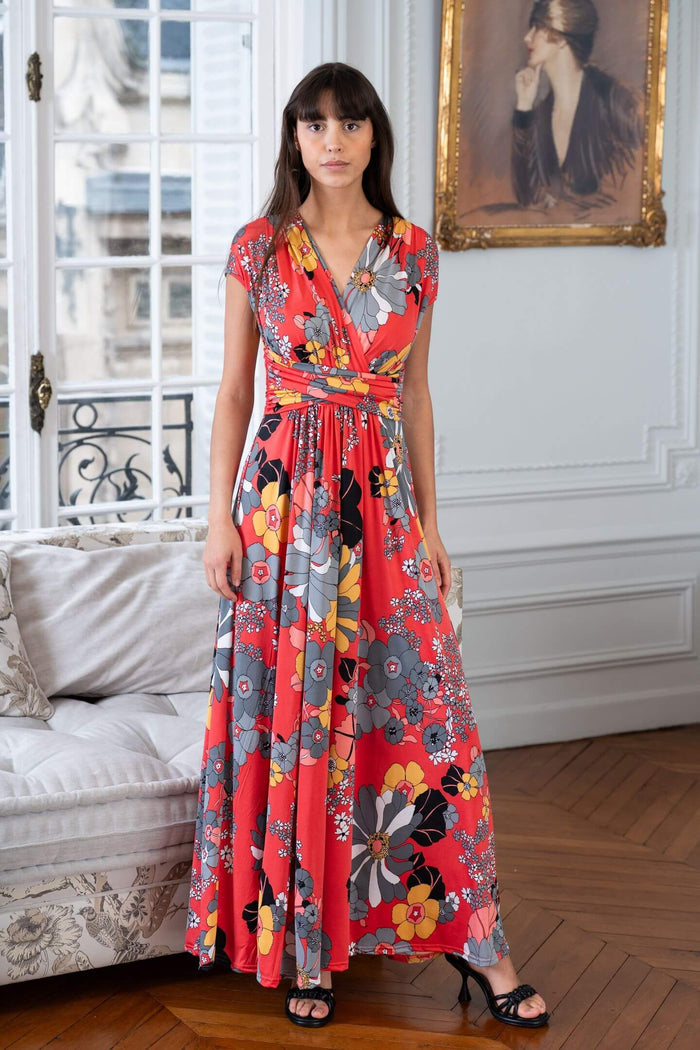 Model poses in Elegance Miss cap- sleeve floral dress