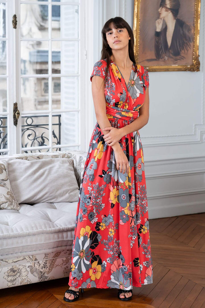 Model dons V-neck floral maxi dress