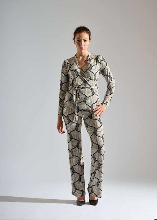 model wears an Elegance Miss black and white two-piece set