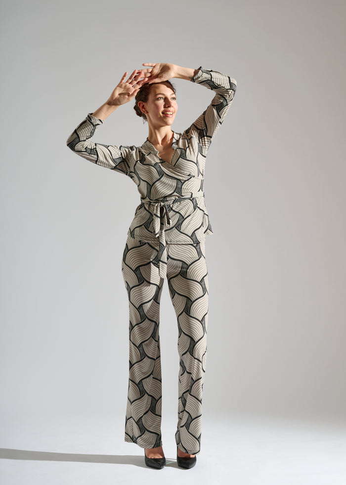 Model dons a black and white two-piece set