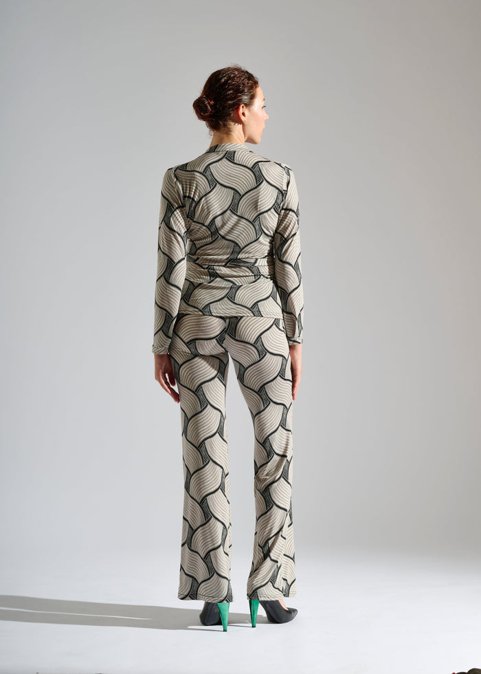 Model shows a black and white two-piece set
