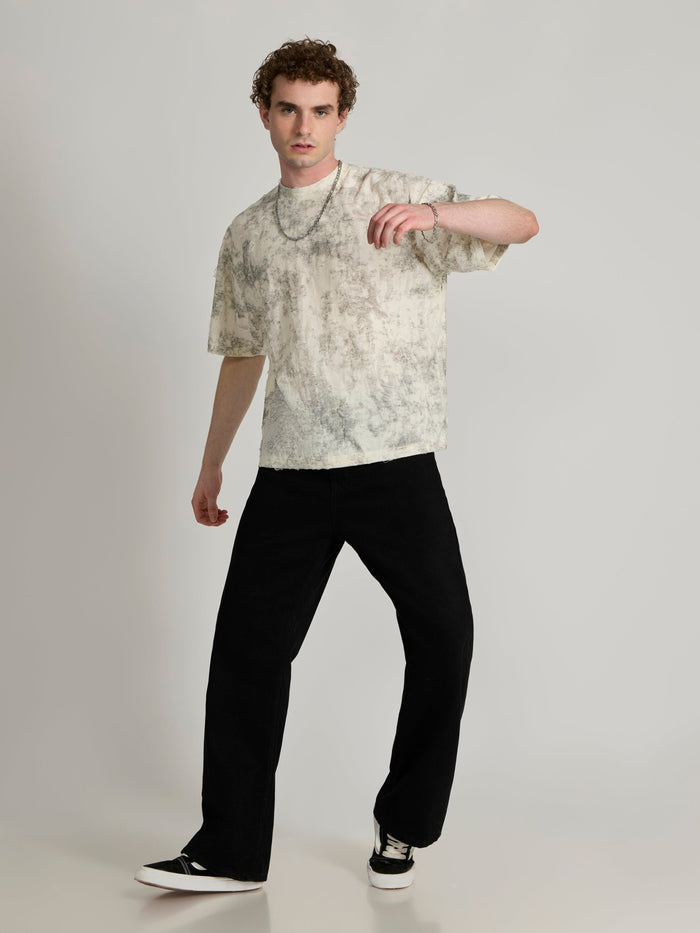 man wearing a Distressed Oversized T-Shirt - black