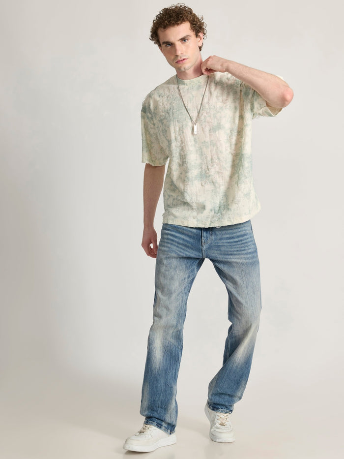 man wearing a Distressed Oversized T-Shirt - green