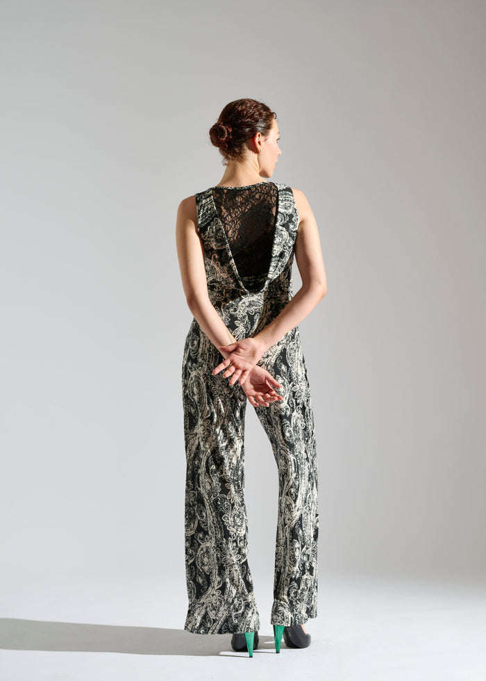 Second back view of Elevran black sleeveless jumpsuit with elegant gold pattern.