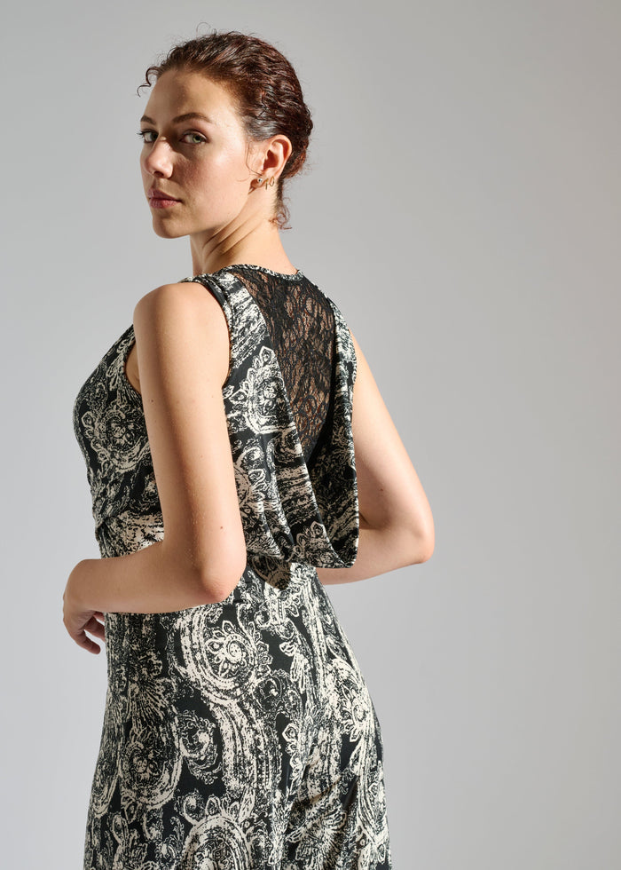 Second close up of Elevran black sleeveless jumpsuit with elegant gold pattern.
