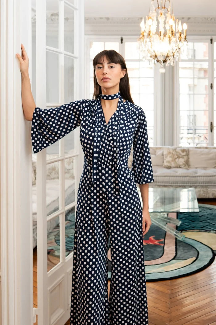 Model dons an Elegance Miss polka dot jumpsuit
