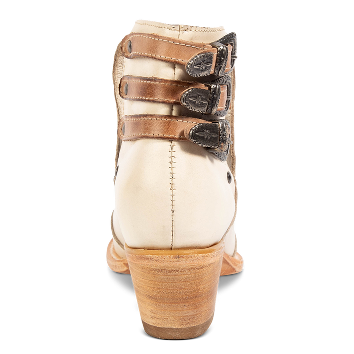 Back view showing s low stacked heel and contrasting heel straps with silver hardware on FREEBIRD women's Melody beige leather shoe