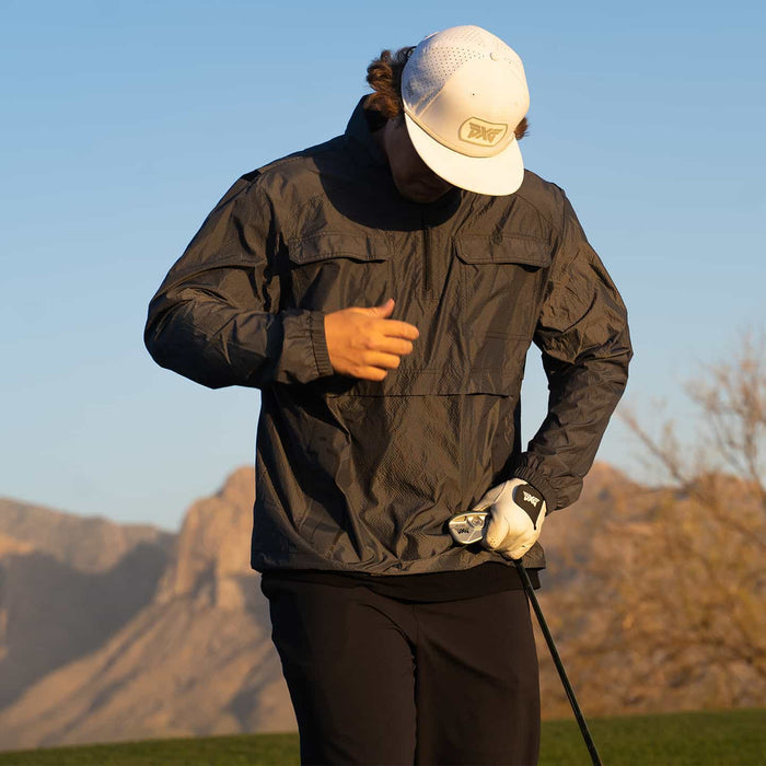 PXG men's grey 1/2 zip pullover jacket on a white background