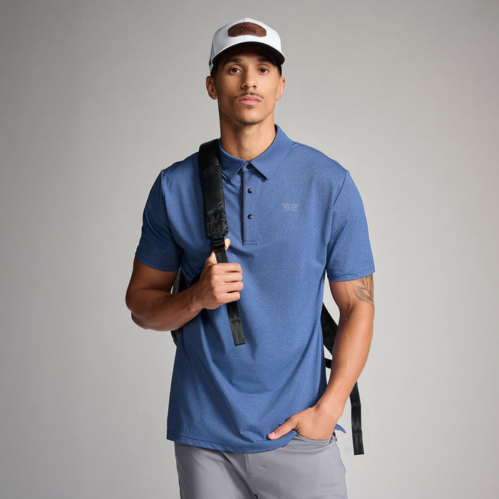 PXG men's blue denim blue polo athletic fit on a white background