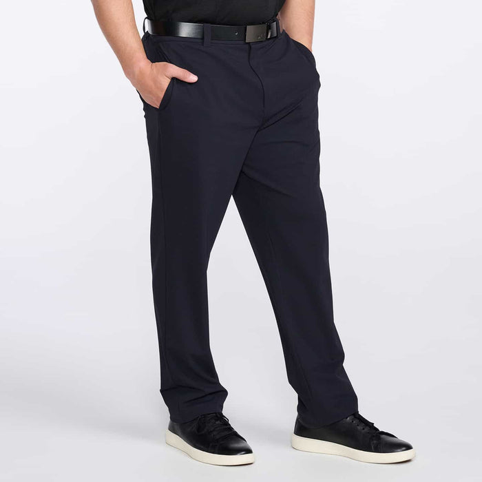 PXG men's navy golf trousers on a white background