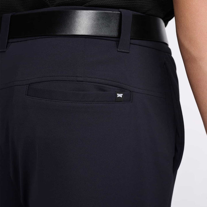 PXG men's navy golf trousers on a white background