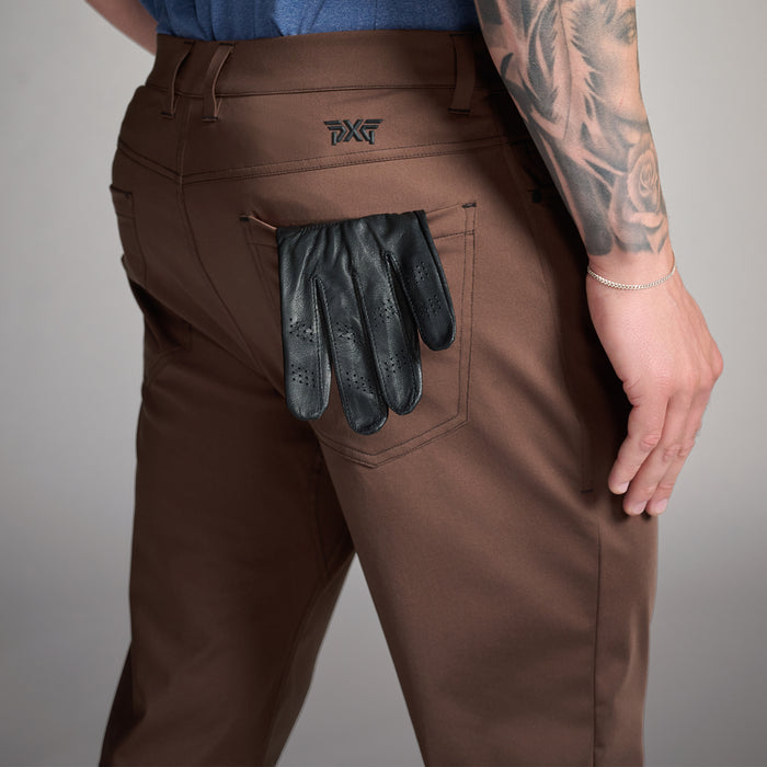 PXG men's brown slim pant on a white background