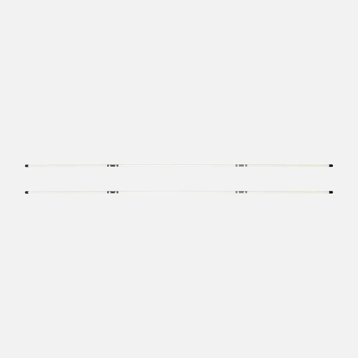 PXG white two golf alignment sticks with a black pxg logo on a white background