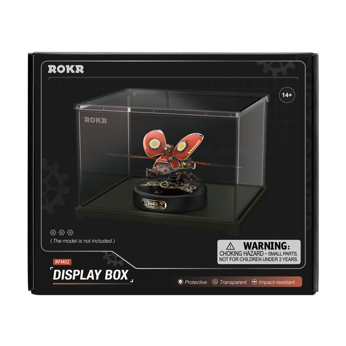 ROKR Display Box RFM02 retail box showing acrylic case containing a mechanical age model on black background with warning label